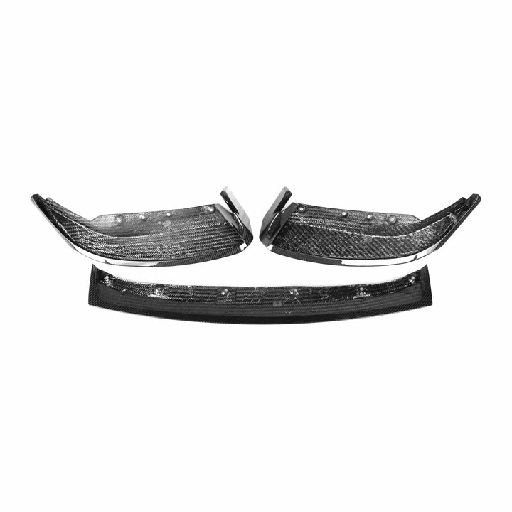 Pre-preg carbon fibre front splitter for BMW M2 G87 on a plain background showing rear side