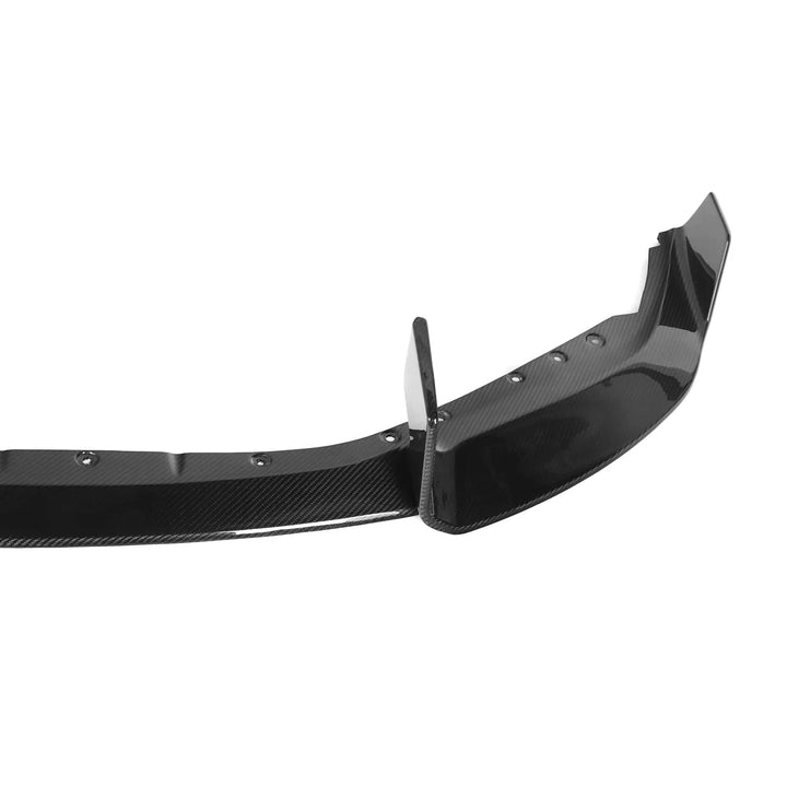Close-up of the carbon weave and gloss finish on a BMW M2 G87 splitter
