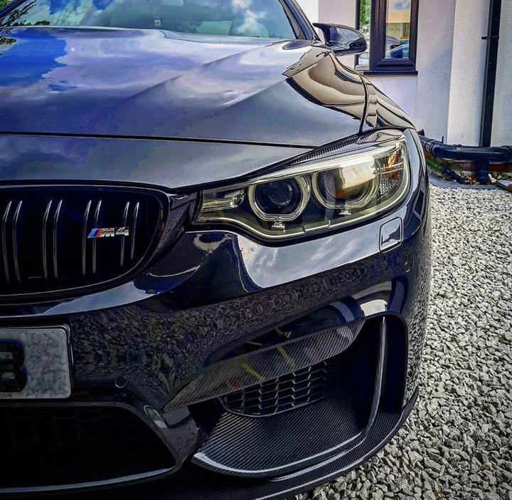 BMW M4 F82 with carbon fibre headlight eyebrows, front view