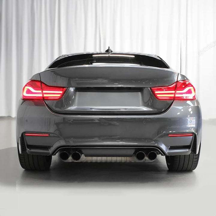 OEM red LED rear bumper lower reflector for BMW M4 F82, close-up of the lens