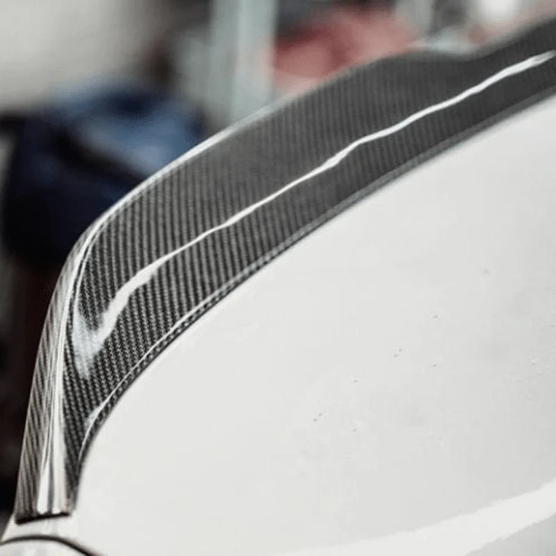 V2 carbon fibre rear spoiler fitted to BMW M5 F90, close up