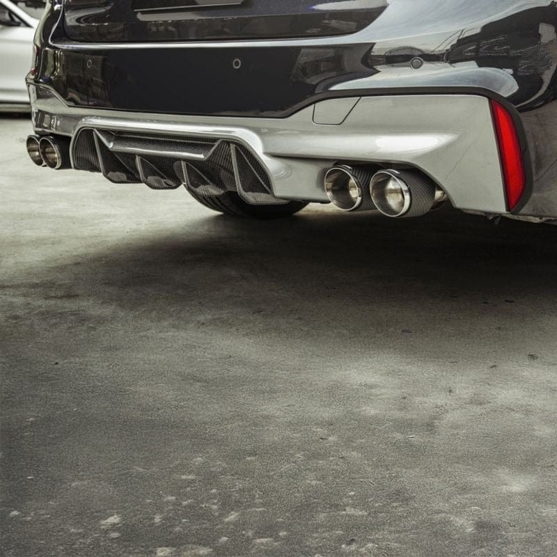 BMW M5 F90 rear bumper with dry carbon diffuser, low angle
