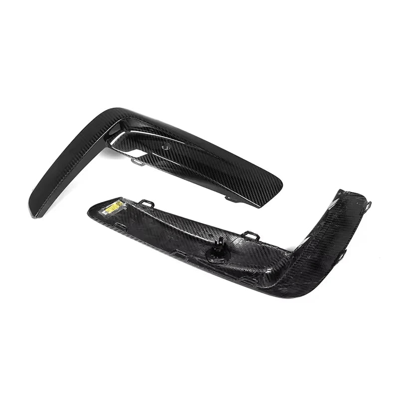 V1 dry carbon fibre front bumper upper trims for BMW M8 F91 F92 F93 on a plain background