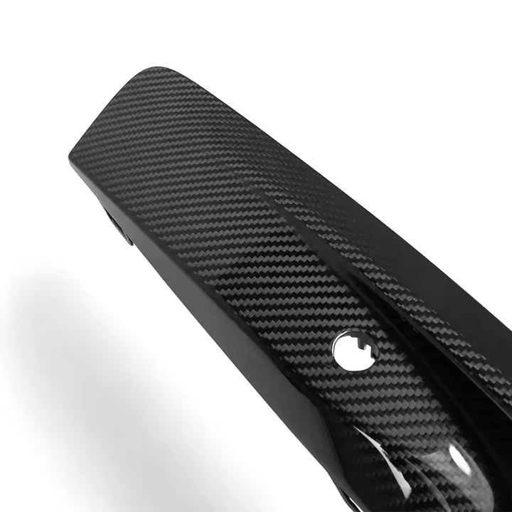 BMW M8 F93 Gran Coupe front bumper with dry carbon fibre upper trims, close-up