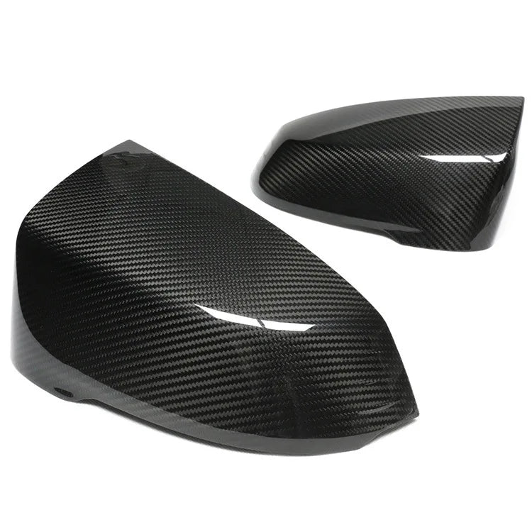 Dry carbon fibre mirror cover for BMW X1 showing weave