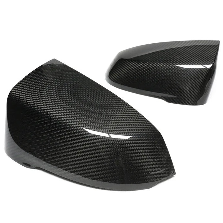 Dry carbon fibre mirror cover for BMW X1 showing weave