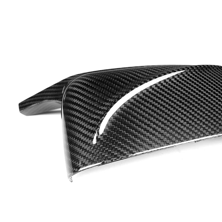 BMW X7 G07 dry carbon fibre mirror cover close-up showing weave