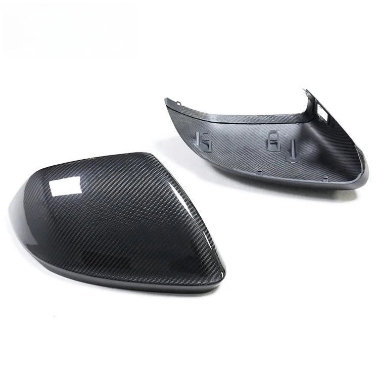 Dry carbon fibre mirror cover for Audi RSQ8 showing weave pattern
