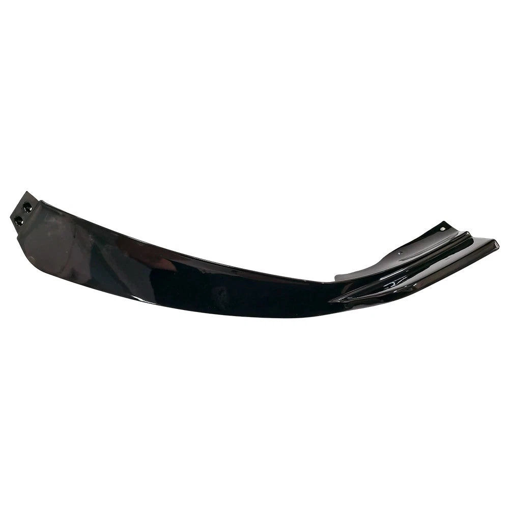 Close-up of the gloss black finish on a Mercedes-Benz C-Class front splitter