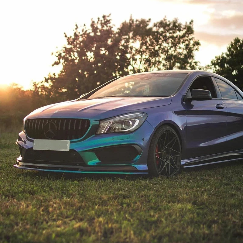 Mercedes CLA C117 pre-facelift fitted with a gloss black vertical slat grille