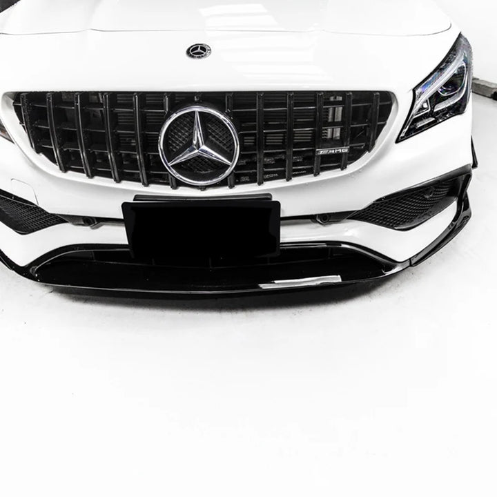 Mercedes CLA C117 facelift fitted with a gloss black vertical slat grille