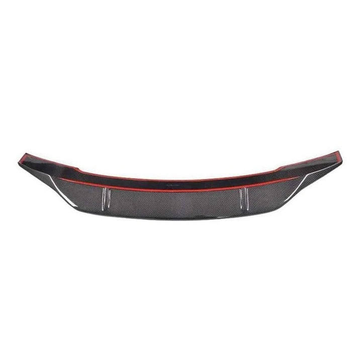 Carbon fibre rear spoiler for Mercedes W213 on a plain background showing adhesive side