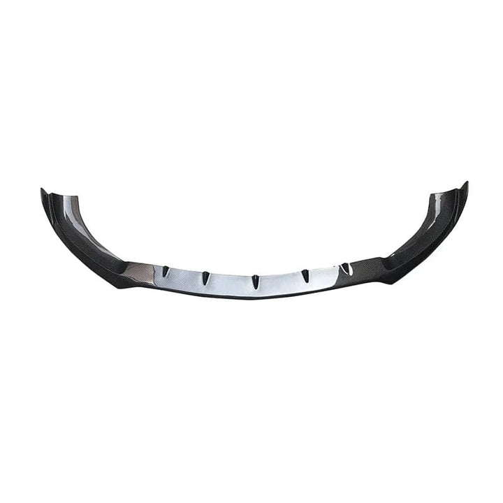 Pre-preg carbon fibre front splitter for Mercedes E63 W213 on a plain background