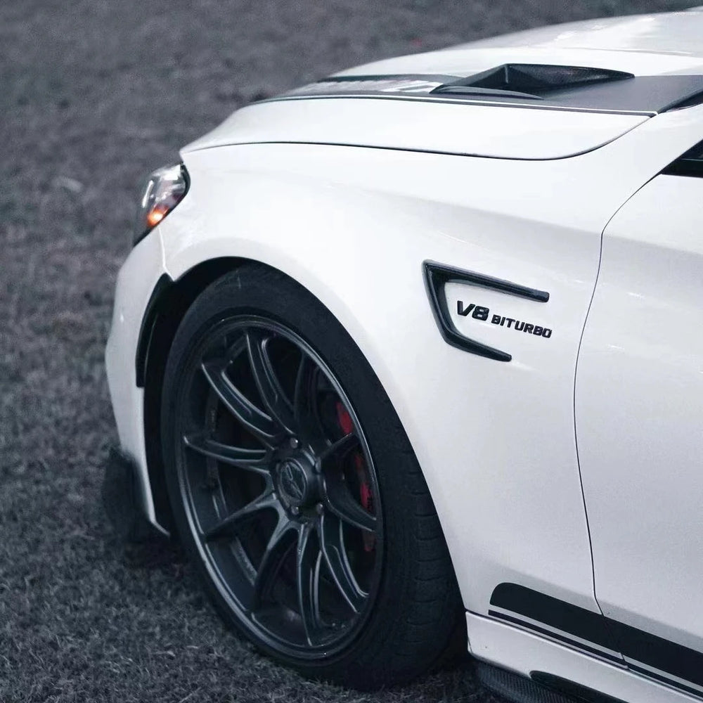 Carbon fibre wing trim for Mercedes C63 Coupé showing weave