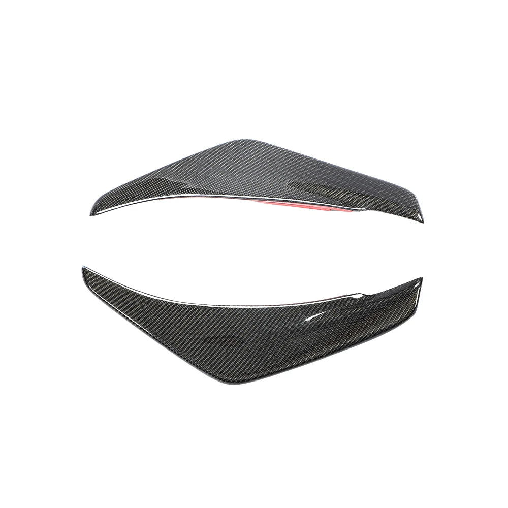 Carbon fibre front canards for MINI Cooper S F55 F56 on a plain background side by side