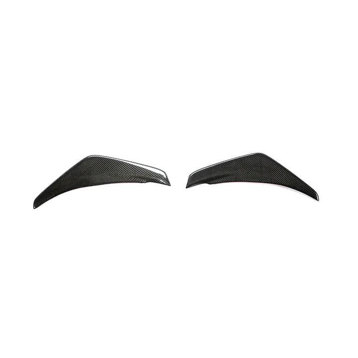 Carbon fibre front canards for MINI Cooper S F55 F56 on a plain background