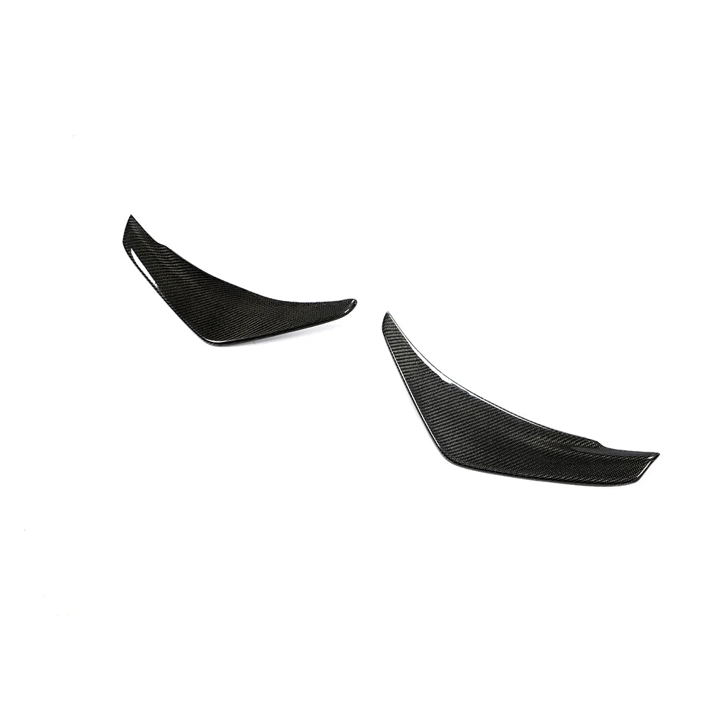 Carbon fibre front canards for MINI Cooper S F55 F56 on a plain background angle shot