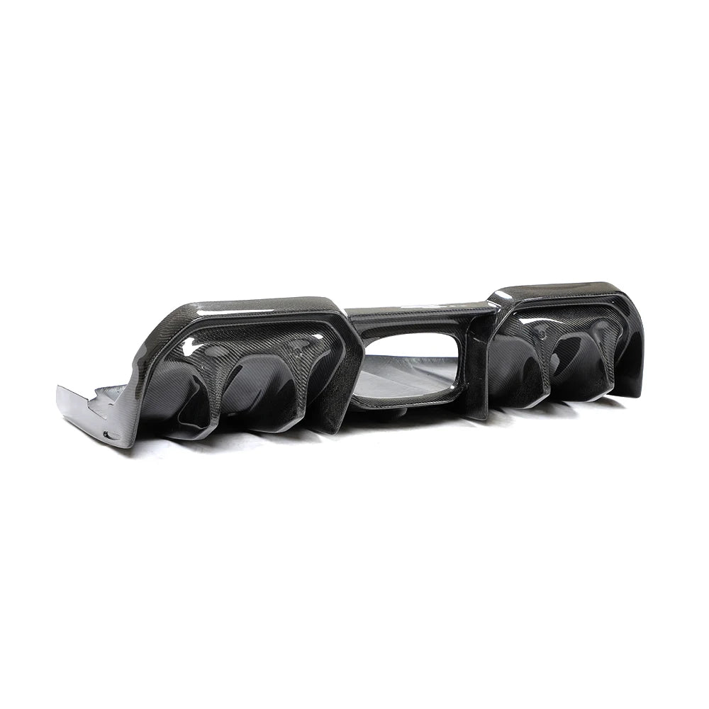 Carbon fibre rear diffuser for MINI Cooper S F56 on a plain background