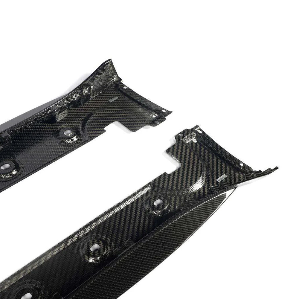 Porsche 911 GT3 992.1 side skirt close-up showing weave