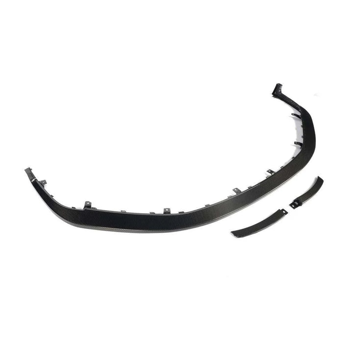 Porsche 911 GT3 992.1 front splitter close-up showing weave