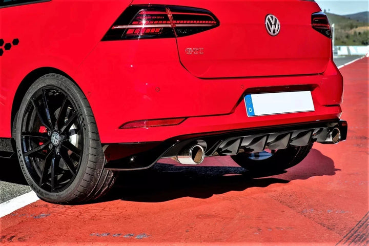 Gloss black rear diffuser fitted to a Golf Mk7.5, rear three-quarter view