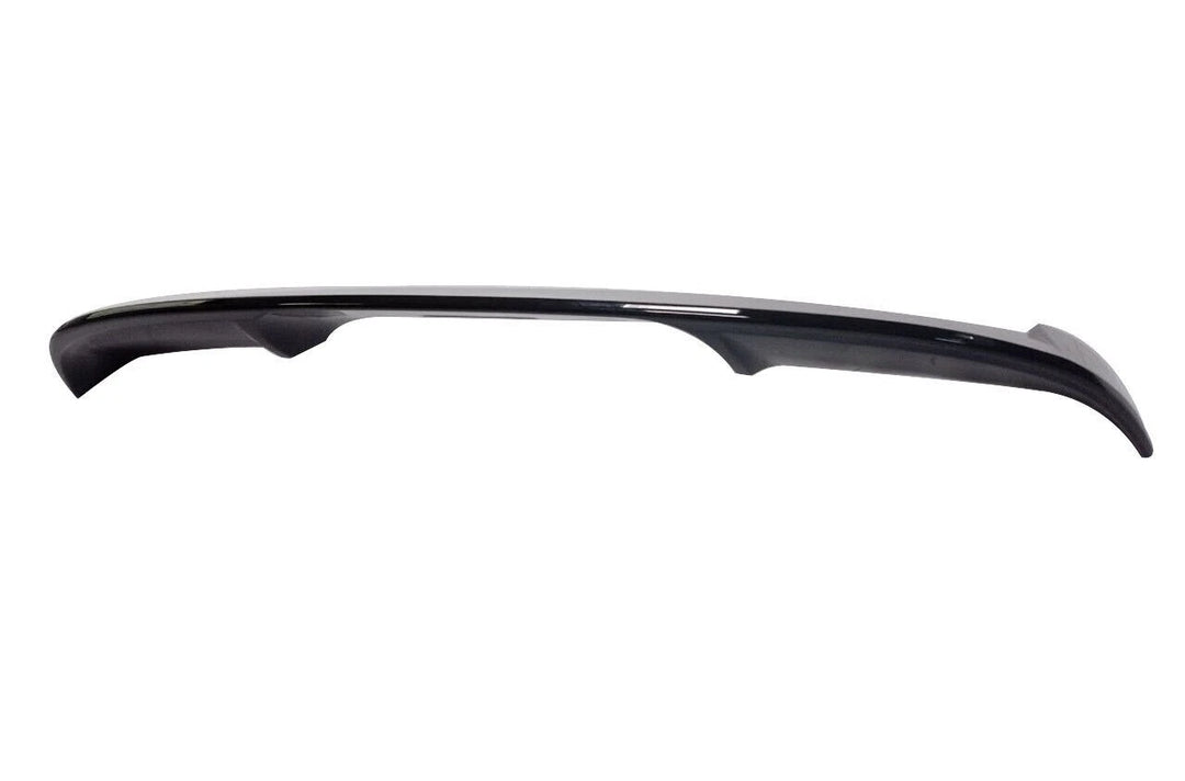 Gloss black rear roof spoiler for SEAT Leon Mk3 on a plain background low angle