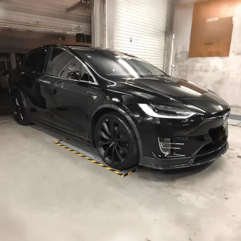 Tesla Model X front fender overlay installed showing weave