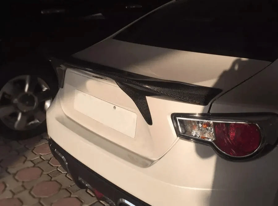 Toyota GT86 pre-facelift carbon fibre large rear spoiler fitted, rear three-quarter view